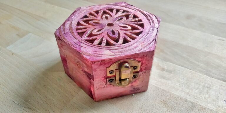 pinkish hexagonal box.