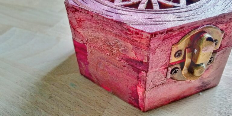 pinkish hexagonal box.